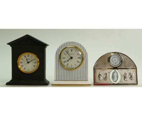 A collection of Wedgwood small Mantle clocks to include: Boxed Muse hanging Cameo Clock, Cased Black Jasperware item and Ralp