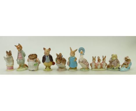 A collection of Beswick Beatrix Potter figures: Beswick gold marked Beatrix Potter figures comprising Jemima Puddleduck, Mr J