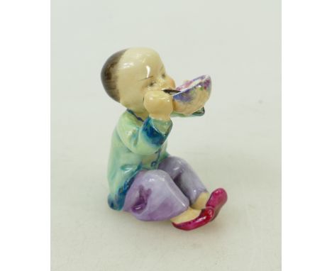 Royal Worcester model of Chinese boy: Royal Worcester figure "China" young boy seated with rice bowl 3073, puce mark, height 