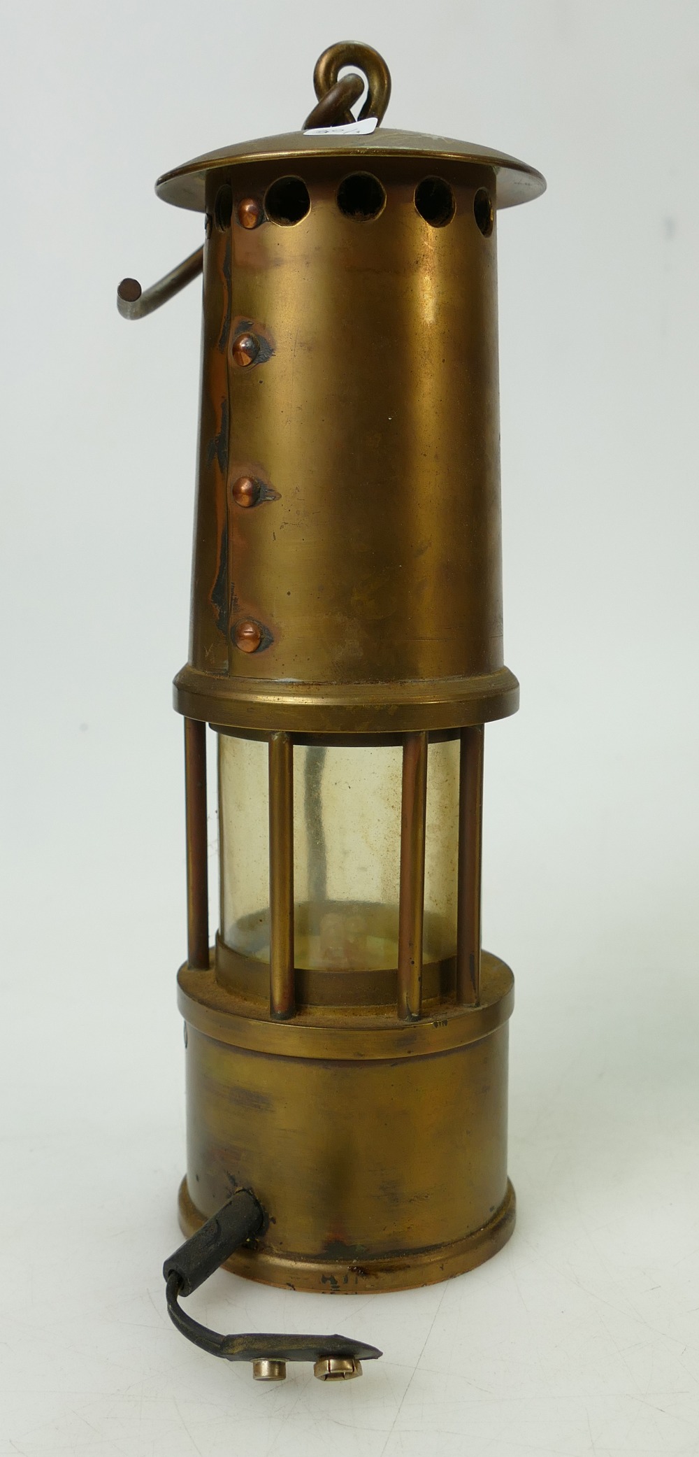 A collection of Brass Miners / Safety Lamps to include E Thomas