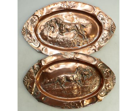 Arts &amp; Crafts hand beaten Copper Trays: Two copper trays with hunting scenes central, 47cm x 29cm (2) 