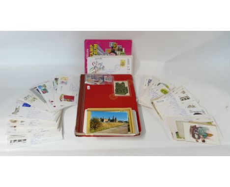 A collection of Stamps: A collection of vintage stamps including many first day covers, album containing good stamps from 193