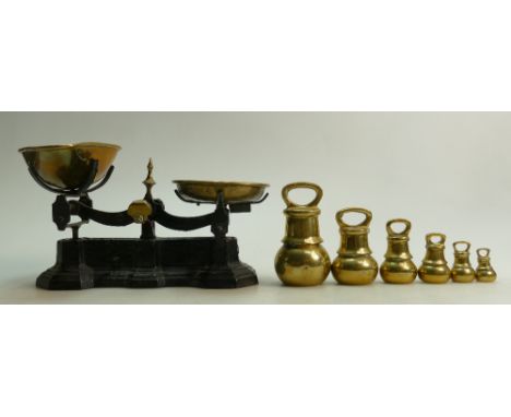 Wrought iron and brass Scales and weights: Wrought Iron and brass scale together with a set of graduated weights