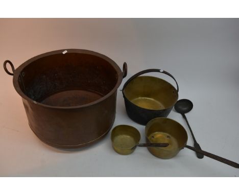 A large copper pot, two brass saucepans, spoon and a bucket (5).