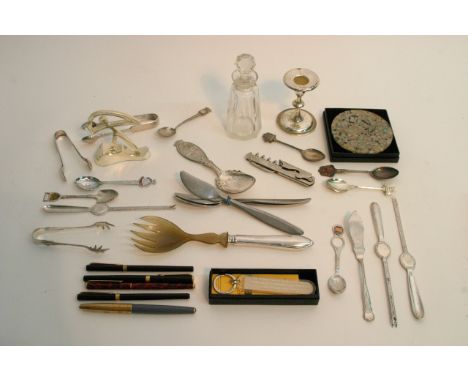 A box containing mixed tableware, pens and small decanter
