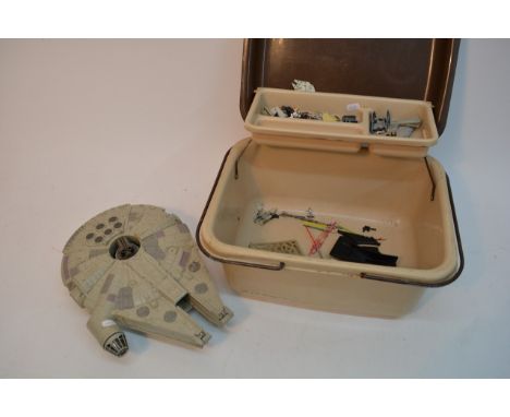A collection of vintage and later Star Wars vehicles including a 1999 Millennium Falcon and later issue figures.