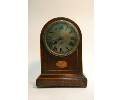 An edwardian inlaid mantel clock