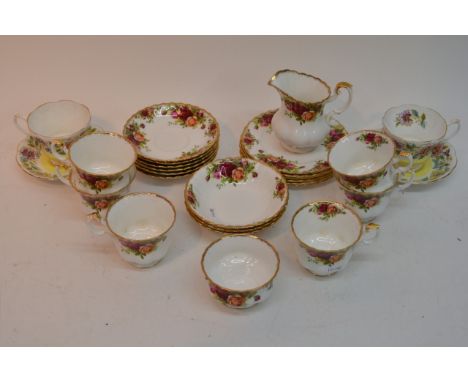 A Royal Albert part tea set in Old Country Roses pattern together with two Royal Albert cups and saucers in Jocobean pattern.