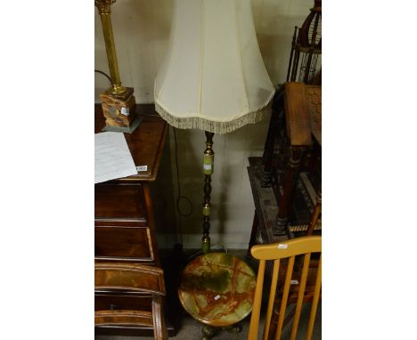 A small circular marble and brass occasional table together with an onyx standard lamp (2).