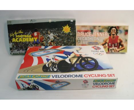 A boxed 2012 Olympics Scalextric cycling set, a vintage Bruce Jenner Decathlon Game and a Billy Hamilton's Football Academy g