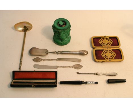 A Parker cigarette holder, two silver Automobile Club knives, a malachite and silver table lighter and other items.