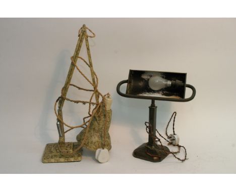 A brass students lamp together with an angle poise