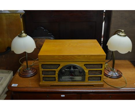 A modern retro style Crosley record deck, CD, tape and radio plus a pair of modern table lamps (3).