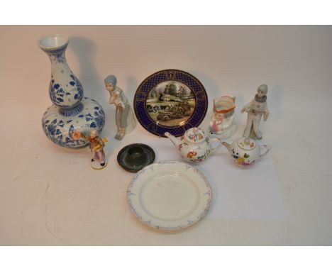 A box containing Lladro style figures and ceramics