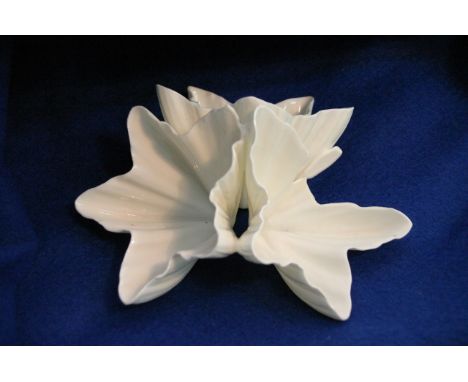 A Royal Worcester tri form dish in the form of flowerheads, G480.