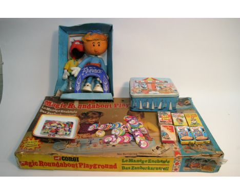 Magic Roundabout playground including figures and trains boxed, a Magic Roundabout cake tin and a boxed Bendy Florence