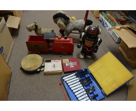 A box containing various toys including a robot