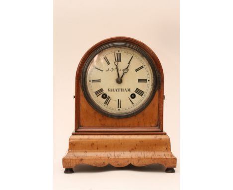 A burr wood mantle clock by S&F Baurle, Chatham, with key
