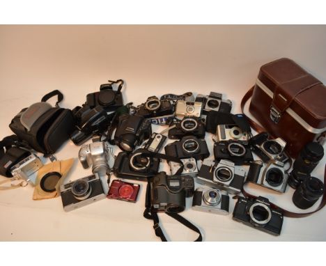 A collection of vintage 35mm film cameras and accessories