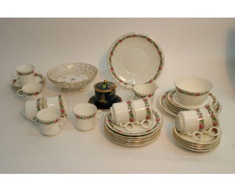 A Meissen dish, Carltonware bleu royale mikado preserve pot and cover and a part tea service decorated with flowers on a whit