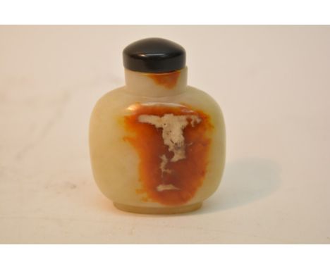 A Chinese Jade type green and russet coloured stone scent bottle