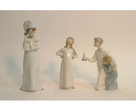 Three Lladro child figures