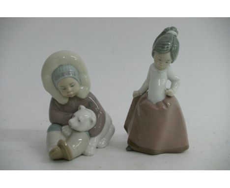 A LLadro figure in the form of an Eskimo and Nad figure
