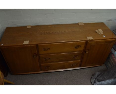 A light wood Ercol sideboard, approx 154cm x 68cm x 44cm.