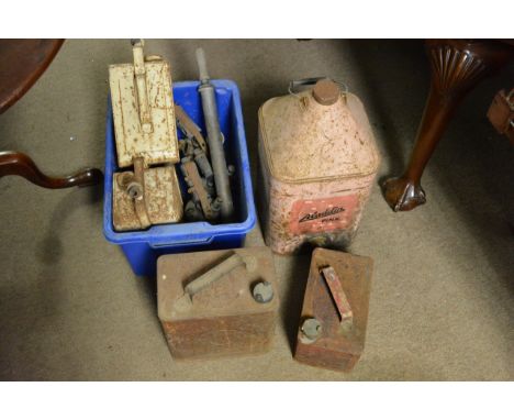 A collection of vintage oil cans, blow torches etc.