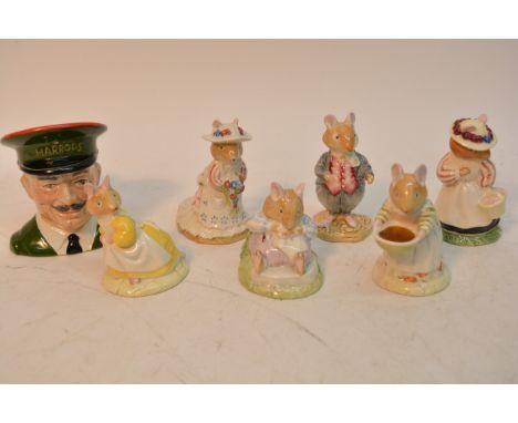 Six Royal Doulton Beatrix Potter figures and a small Carltonware Harrods character jug (7).