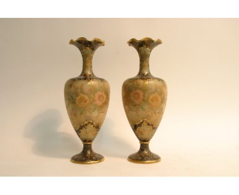 A pair of Carltonware frilled rim, footed vases with painted and gilded floral decoration. Approximately 29cm