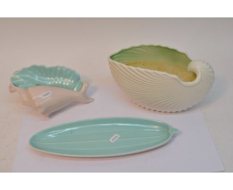 A collection of three Poole dishes, two in the form of shells