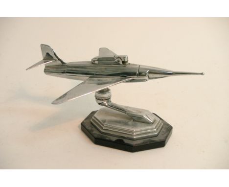 An Art Deco chrome desk lighter in the form of a fighter jet