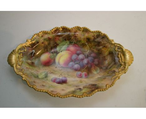 A Royal Worcester oval fruit dish decorated with apples and grapes signed F Roberts 31cm