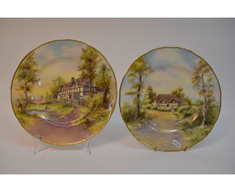 Two handpainted Royal Worcester plates, one by James Allen (1953) and one by John Smith (1955).