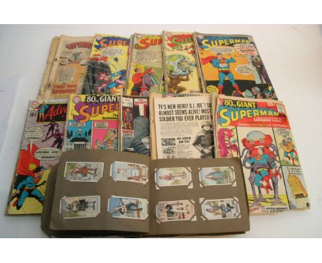 A collection of vintage comics to include silver age Superman issues, Mighty Thor issue 165 and others.