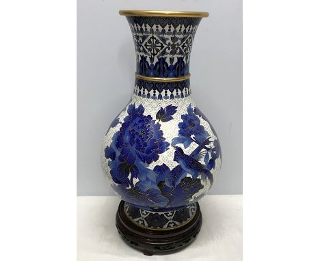 Large Chinese brass cloisonné blue and white vase with carved wooden stand. Decorated with birds and foliage, 43 h on base st