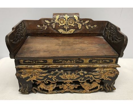 Chinese mahogany trinket box, gilt decorated with dragons and 'Foo' dogs, raised gallery top with lift up lid and drawer to t