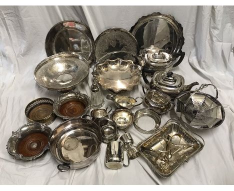 Selection of silver plated table and tea ware, trays, teapots, jugs, bottle stands, serving bowls, spirit cup etc. Condition 