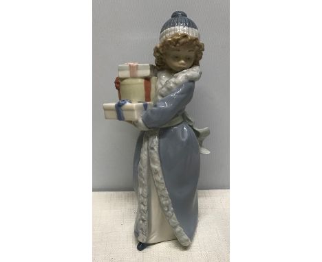 Nao Lladro Daisa 1985, figurine girl with gift boxes, 23cms h. Condition ReportVery good condition.&nbsp;