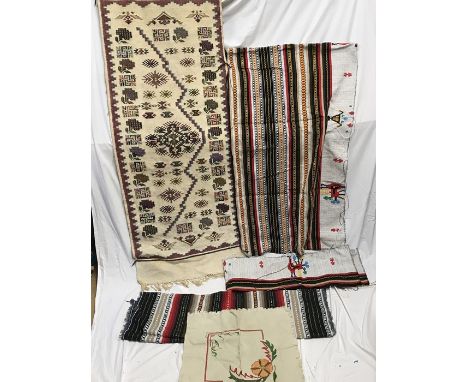 Handmade needlework wall hanging of sampler style embroidery. 11 l x 59cms w, together with handmade needlework materials, 2 