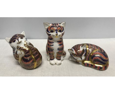 Royal Crown Derby paperweight figures, Cats, Sleeping 4.5cms h, Playing 6cms h and Seated 8.5cms h. Condition ReportVery good