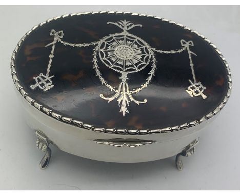 Hallmarked silver and tortoiseshell pique trinket box with velvet lining. London 1906, maker William Comyns. 13 x 9cms, 209gm