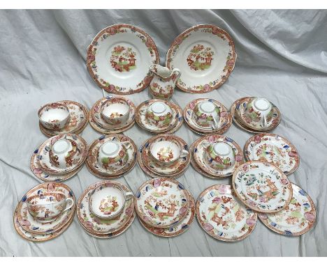  A part tea service, 2 cake plates, jug, 11 cups, 12 saucers, 16 side plates, garden design. 1 bowl. (29 pieces)Condition Rep