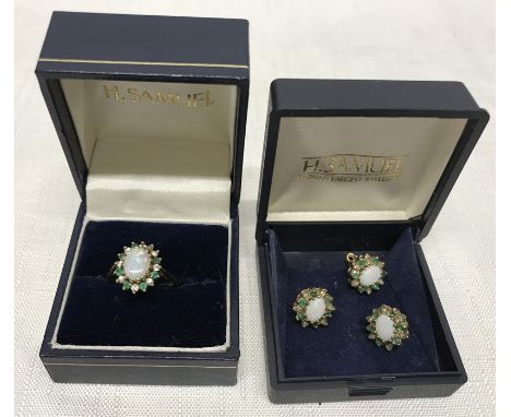 Hallmarked 9ct gold ring and matching set of three stud earrings set with opal surrounded by diamonds and green stones, size 