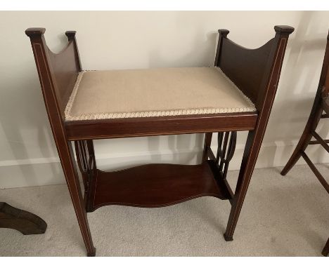 An Edwardian inlaid upholstered topped stool. 48.5 w x 35 d x 70cms h. Label for Denby Spinks, Leeds.Condition ReportLight su