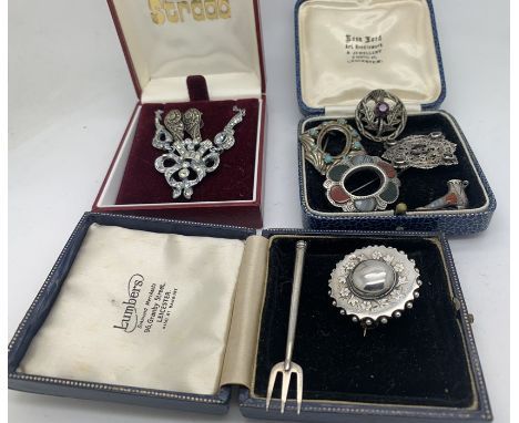 Various mainly white metal jewellery to include pickle fork, brooch, filigree brooch set with 5 red stones, thistle brooch an