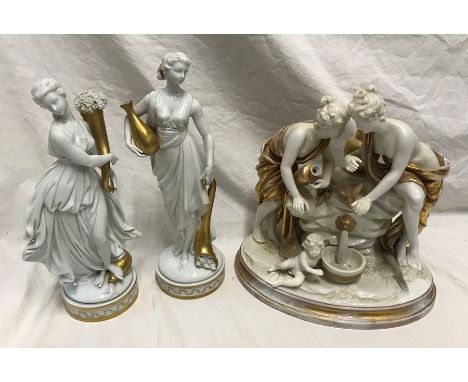 Capodimonte porcelain figurines, pair of white pottery female figures carrying a vase and flowers, 27cms h and a figurine gro