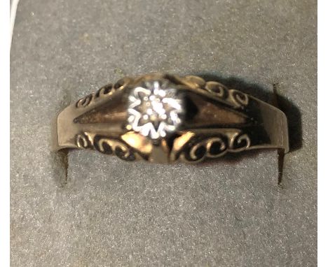 A 9ct gold diamond set ring, size W, 2.6gms. 