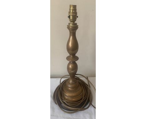 Brass table lamp. 39cms h. On turned wooden base. Condition ReportGood condition.